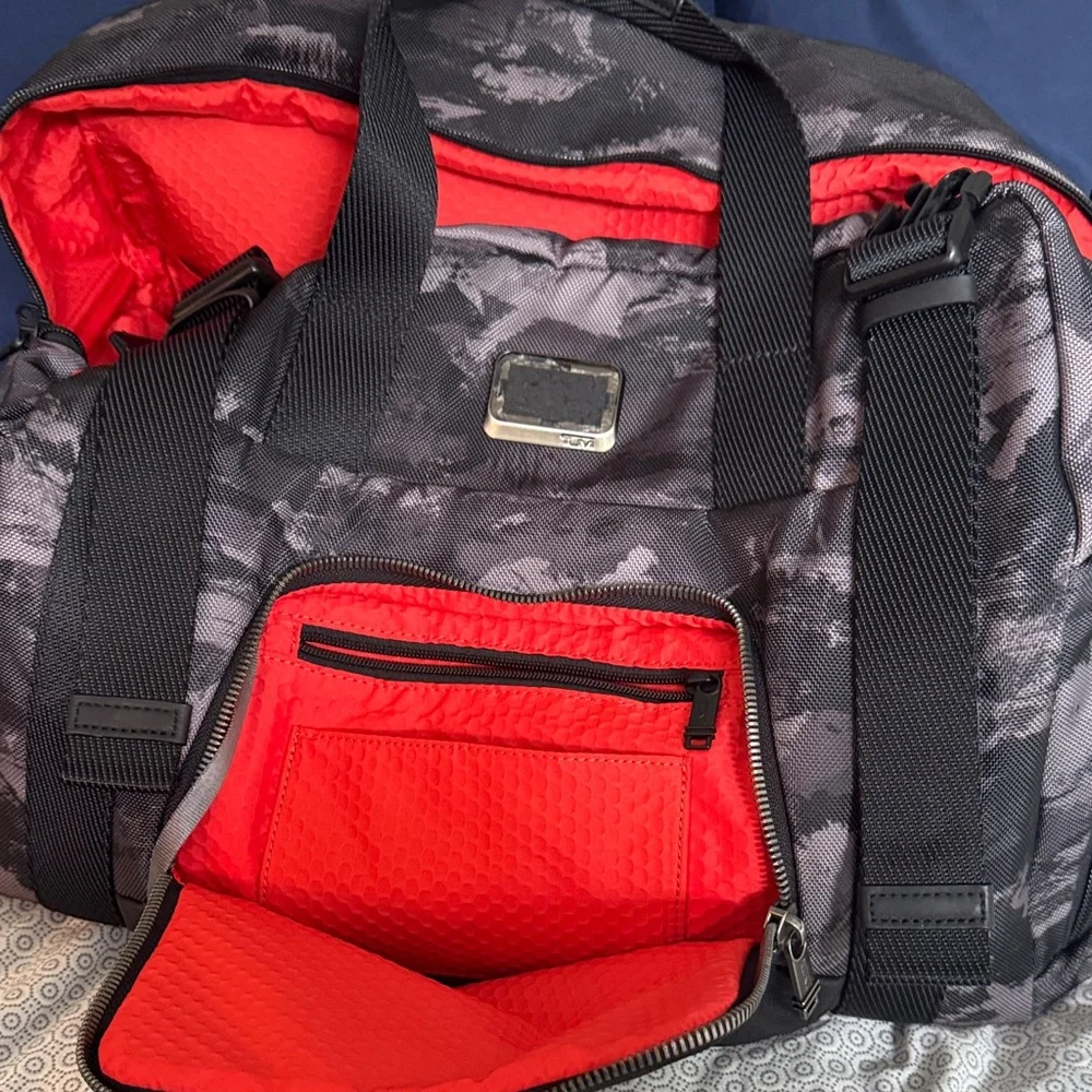 Tumi Black Camo Duffel Bag with Red Interior